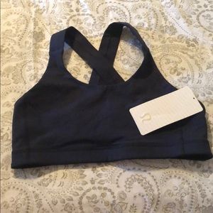 Lulu sports bra in navy blue. New with tags